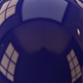 Reflections of rectangular windows create a distorted effect on a shiny, dark spherical Royalty Free Stock Photo