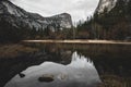 Reflections of Rocks and Dear Tree Branches in Mirror Lake in Yosemite National Park, California Royalty Free Stock Photo