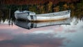 Reflections of rowing boats in Loch Rusky