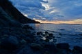 reflections on the stones, rocks on the shoreline Royalty Free Stock Photo