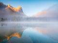 Reflections on the surface of the lake. Banff National Park, Alberta, Canada. Fall. Landscape during sunrise. Royalty Free Stock Photo