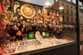 Reflections of the tourists on the windows of the Venetian carnival mask shops in Venice, Italy