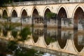 Reflections in the water. Old chinese bridge. The ancient Shuanglong Bridge Seventeen Span Bridge near Jianshui, Yunnan, China