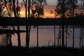 Vivid bright sunset over water at Lake Tinaroo Royalty Free Stock Photo