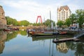 Reflections of The White House Witte Huis, Art Nouveau historical building and historical houseboats at Oudehaven Harbor