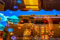 Reflections in a window in downtown Santa Fe showing a very blue sky and Turkish lanterns and adobe architecture Royalty Free Stock Photo