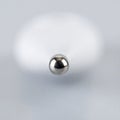 Reflective Chrome Sphere on a Minimalist Background Royalty Free Stock Photo