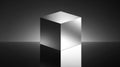 Polished Metal Cube on Reflective Surface, Abstract Geometric Shape, Studio Lighting Royalty Free Stock Photo