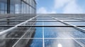Reflective glass facade of modern skyscraper building showcasing geometric patterns and blue sky reflections in an urban Royalty Free Stock Photo