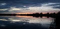 Reflective sunset on a prairie lake Royalty Free Stock Photo