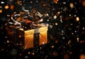 A reflective surface holds an open golden gift box, with gold confetti and streamers exploding out from within Royalty Free Stock Photo