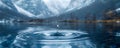 Reflective water droplet above serene lake captures light in snowy mountain landscape. Concept Nature, Water Reflection, Snowy Royalty Free Stock Photo