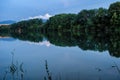 Reflecton of trees on water level of pond Royalty Free Stock Photo