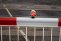 The reflector/ light on the level crossing barriers