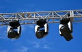 Reflectors of the stage against blue sky