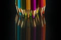 Color pencils on black background Royalty Free Stock Photo