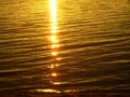 Lake Baikal on summer. Reflexion of the sun at sunrise