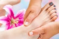 Reflexologist working on female foot Royalty Free Stock Photo