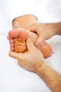 Reflexology foot massage Royalty Free Stock Photo