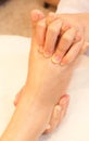 Reflexology foot massage, spa treatment Royalty Free Stock Photo