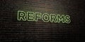 REFORMS -Realistic Neon Sign on Brick Wall background - 3D rendered royalty free stock image