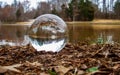 A Crystal Ball Inverts Image of Lake Fountain Royalty Free Stock Photo