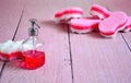 Refresh and disinfection the house , tools for cleaning home , pink sponges and crystal dispenser with red liquid Royalty Free Stock Photo