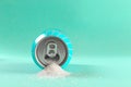 Refresh drink can pouring sugar stream in sweet and calories content of soda and energy drinks concept in unhealthy nutrition and Royalty Free Stock Photo