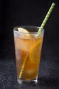 Refresh Ice tea with lemon. Black stone background Royalty Free Stock Photo