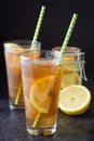 Refresh Ice tea with lemon. Black stone background Royalty Free Stock Photo