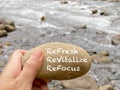 Refresh revitalize refocus text written on stone background. Health care concept.