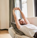 Refreshed and ready to get going again. a man enjoying his weekend at home. Royalty Free Stock Photo