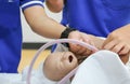 Refresher training to assist childbirth newborn with medical baby dummy