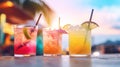 Refreshing alcoholic cocktails with ice, mint and fruit on the bar in close-up against the sea. Sunset. Party Royalty Free Stock Photo