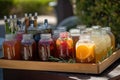 A refreshing, BBQ beverage display, showcasing a selection of ice-cold drinks, such as lemonade, iced tea, craft beers, set Royalty Free Stock Photo