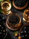 Refreshing Black Pearls and White Wine Delight on Rustic Table Royalty Free Stock Photo