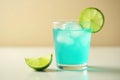 Refreshing blue citrus drink with ice cubes and lime garnish on bright surface. Generative AI Royalty Free Stock Photo