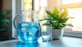 Refreshing Blue Drink, Ice Cubes, and Glass on Table, Emphasizing Sustainability with Space for text Royalty Free Stock Photo