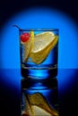 Refreshing Blue Hawaii Cocktail Punch with lemon and Cherry Royalty Free Stock Photo