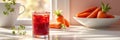 Refreshing carrot and berry juice in sunlit kitchen Royalty Free Stock Photo
