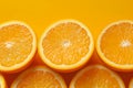 Refreshing citrus display orange slices on a vibrant yellow backdrop