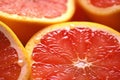 Refreshing citrus slices, up-close look at juicy grapefruit segments Royalty Free Stock Photo