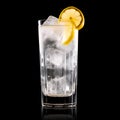 Refreshing classic Tom Collins or Whiskey sour cocktail with a maraschino cherry and lemon slice on black background Royalty Free Stock Photo