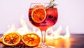 Refreshing cocktail with citrus fruit, ice, and a flaming garnish generated by AI Royalty Free Stock Photo