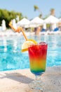 Refreshing cocktail near swimming pool, close up Royalty Free Stock Photo