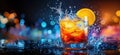 Refreshing cocktail splash with orange slice and ice in vibrant bokeh background Royalty Free Stock Photo