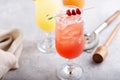 Refreshing cocktails or mocktails with oranges and cranberries