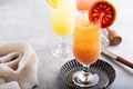 Refreshing cocktails or mocktails with oranges and cranberries