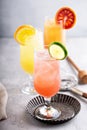 Refreshing cocktails or mocktails with oranges and cranberries Royalty Free Stock Photo