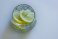 Refreshing cold lemon Cocktail  on white background. Royalty Free Stock Photo